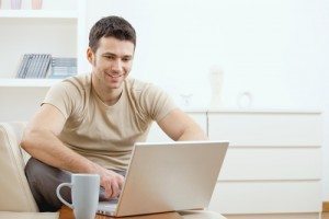 man studying online learning course to become a buyers agent